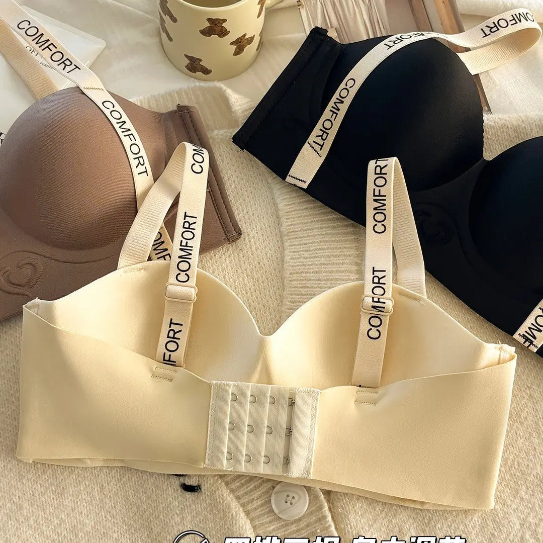 Black no-wire women's underwear with supportive design, lifting and enhancing small breasts, featuring adjustable letter bra straps.