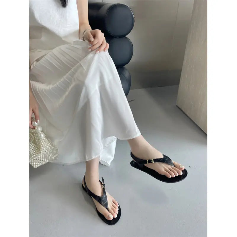 Black European and American summer thong flat sandals for women, casual Roman style shoes by SHOPEZRA L.L.C.