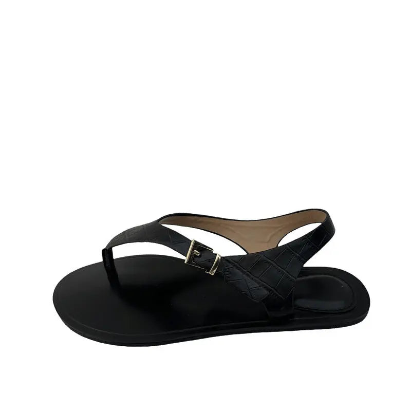 Black women's thong flat sandals from SHOPEZRA L.L.C., European and American summer casual Roman-style footwear.