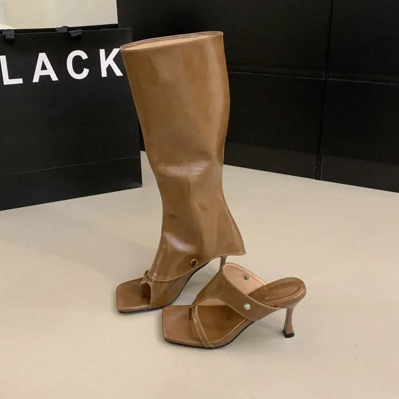 Black 2025 SHOPEZRA L.L.C. thong-toe Roman sandals with stiletto heels, versatile long tube boots for women, worn as outdoor slippers.