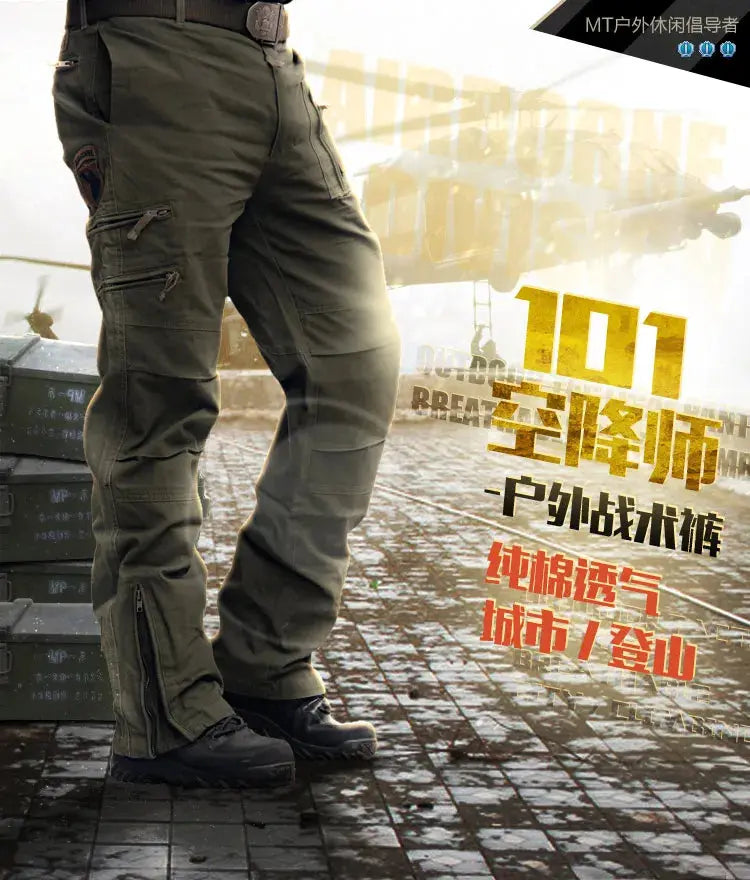 Men's tactical cargo pants in black with vintage green camouflage, multiple pockets, cotton material, suitable for outdoors and work.