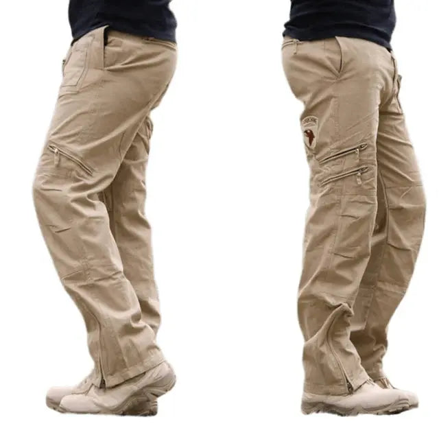 Men's tactical cargo pant in vintage green camouflage with multiple pockets, made of cotton for outdoor work and casual wear.