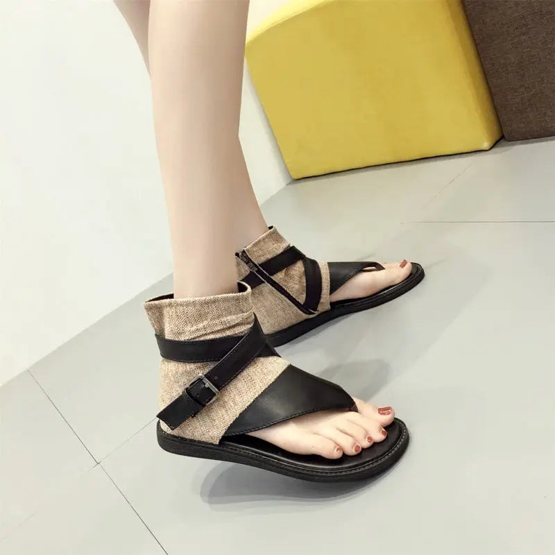 Black Korean style thong-toe high-top sandals with flat soles, featuring modern spring and summer fashion for women.