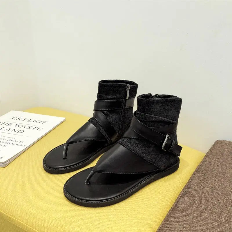Black Korean-style thong-toe high-top sandals for women with flat soles, featuring a modern spring and summer fashion design.