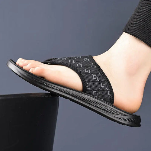 Black men's summer flip-flops by SHOPEZRA L.L.C., non-slip trendy thong sandals perfect for outdoor wear.