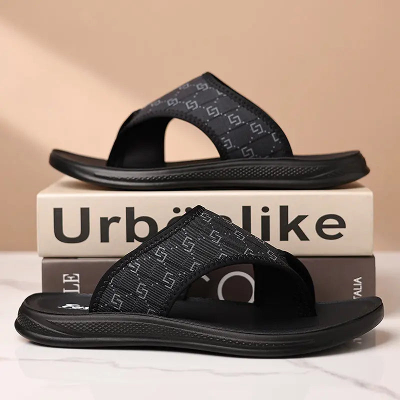 Black men's summer flip-flops by SHOPEZRA L.L.C. with non-slip soles, trendy thong style, perfect for outdoor wear.