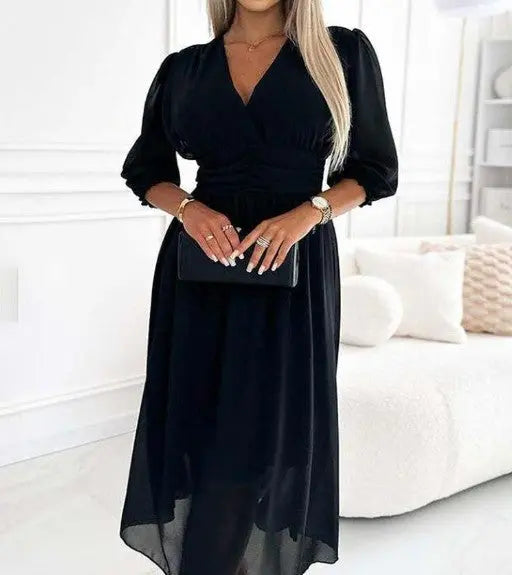 Black V-neck chiffon dress by SHOPEZRA L.L.C. in plus size, featuring flowing fabric and elegant design.