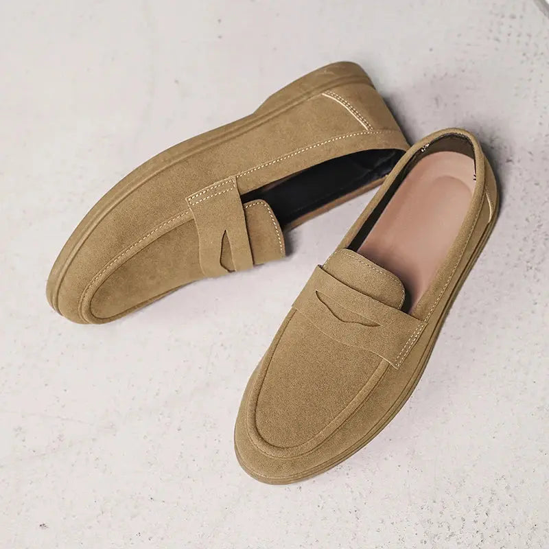 Black men's slip-on loafers by Shopezra L.L.C., lightweight, breathable, non-slip casual shoes with soft soles for daily outdoor walking.