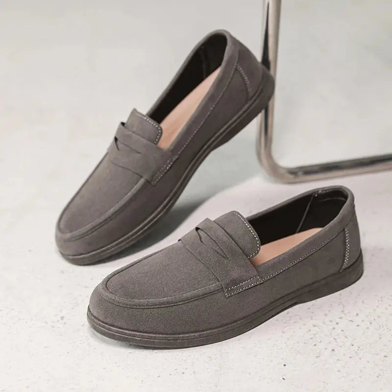 Black men's slip-on loafers by SHOPEZRA L.L.C., lightweight, breathable, non-slip casual shoes with soft soles for daily walking.