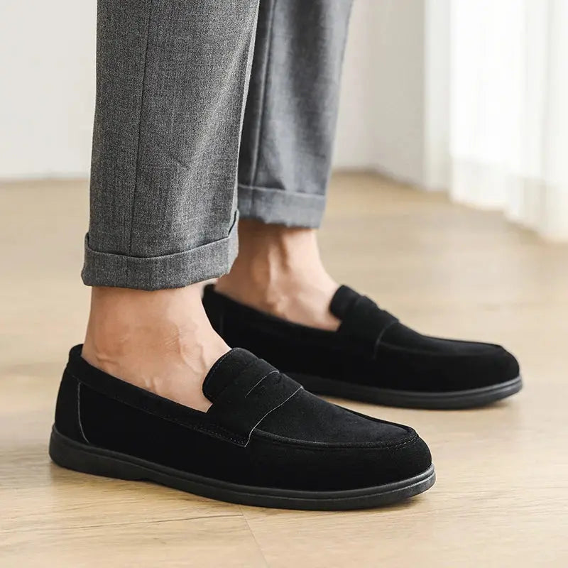Black men's slip-on loafers by SHOPEZRA L.L.C., lightweight, breathable, non-slip casual shoes with soft soles for daily outdoor walking.