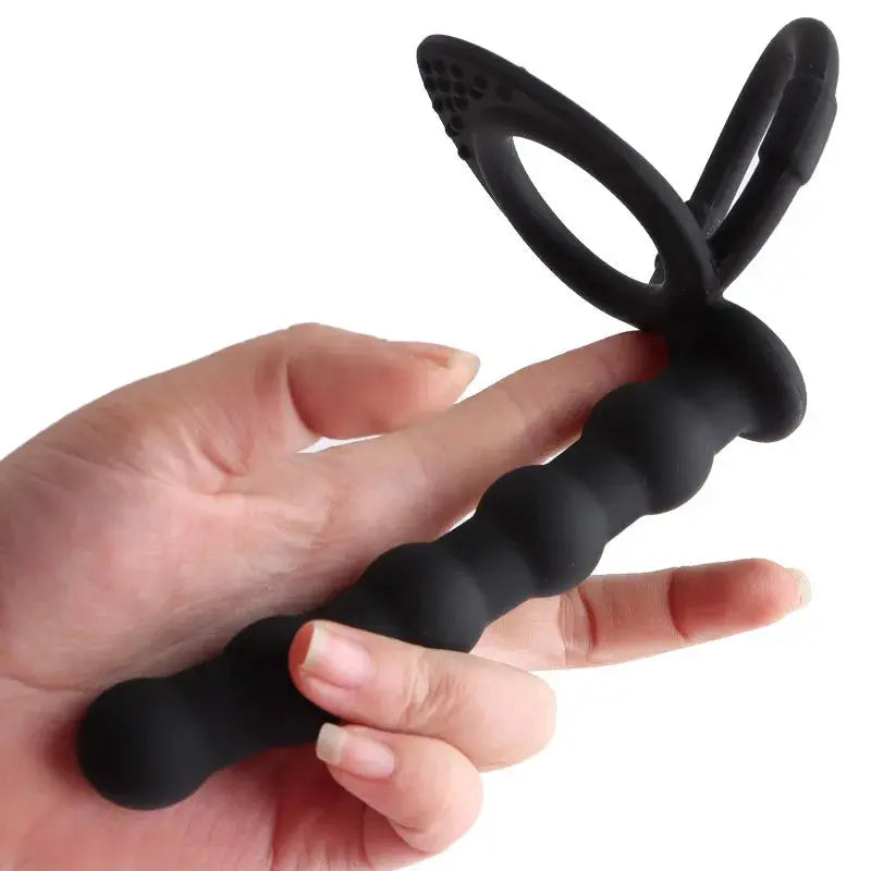 Black dildo penis vibrator with double penetration, anal beads, butt plug, sex ring, and G-spot massager for adult use.