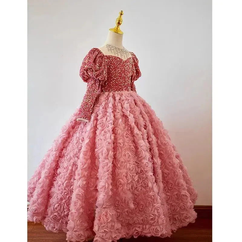 Pink shiny children's dress for girls by SHOPEZRA L.L.C., featuring long sleeves, suitable for birthdays, banquets, and piano performances.