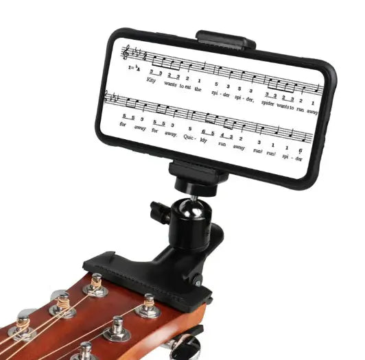 Black phone guitar clip stand by SHOPEZRA L.L.C. holds a smartphone securely with a guitar-shaped clip for easy hands-free use.