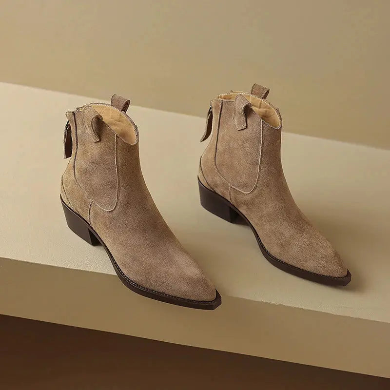 Black cow suede Western ankle boots for women with pointed toes, mid block heels, back zipper, and plush lining.