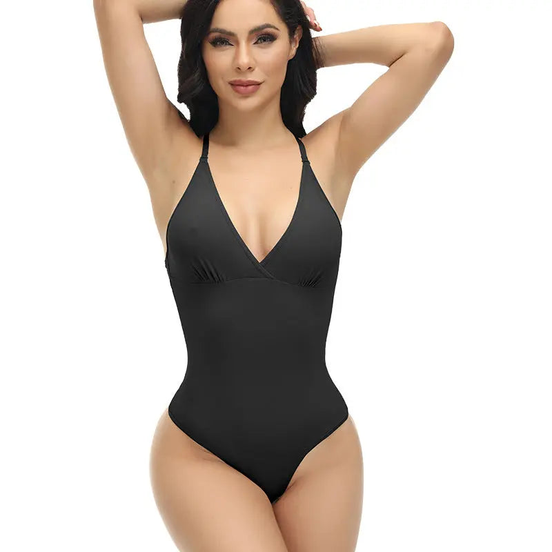 Black plus-size shapewear bodysuit with tummy control, waist cincher, and elastic fit for body shaping by SHOPEZRA L.L.C.