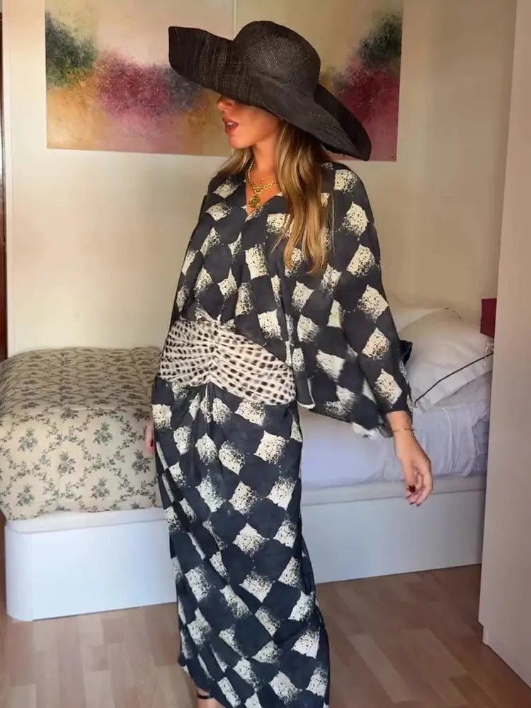 Black plaid printed women's long dress with V-neck, batwing sleeves, waist cinching, suitable for spring and summer casual wear.