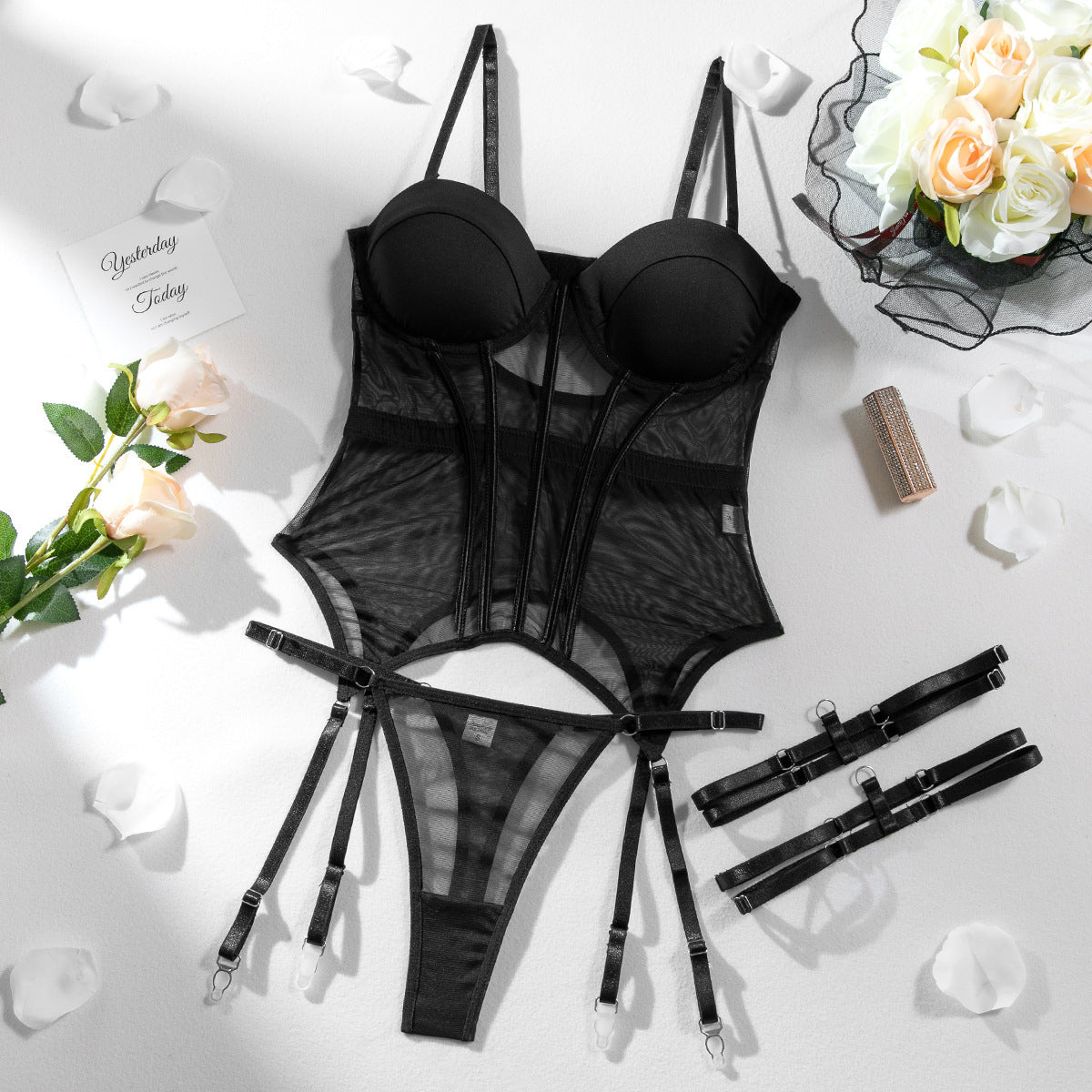 Black women's transparent mesh jumpsuit with stitching details, cotton gathering, and sexy design, perfect as underwear or stylish wear.