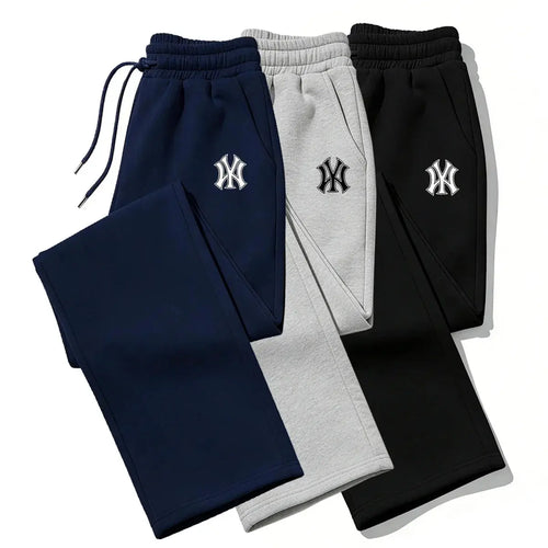 Black men's sweatpants by SHOPEZRA L.L.C. with printed design, elastic waist, and comfortable jogger style for casual wear.