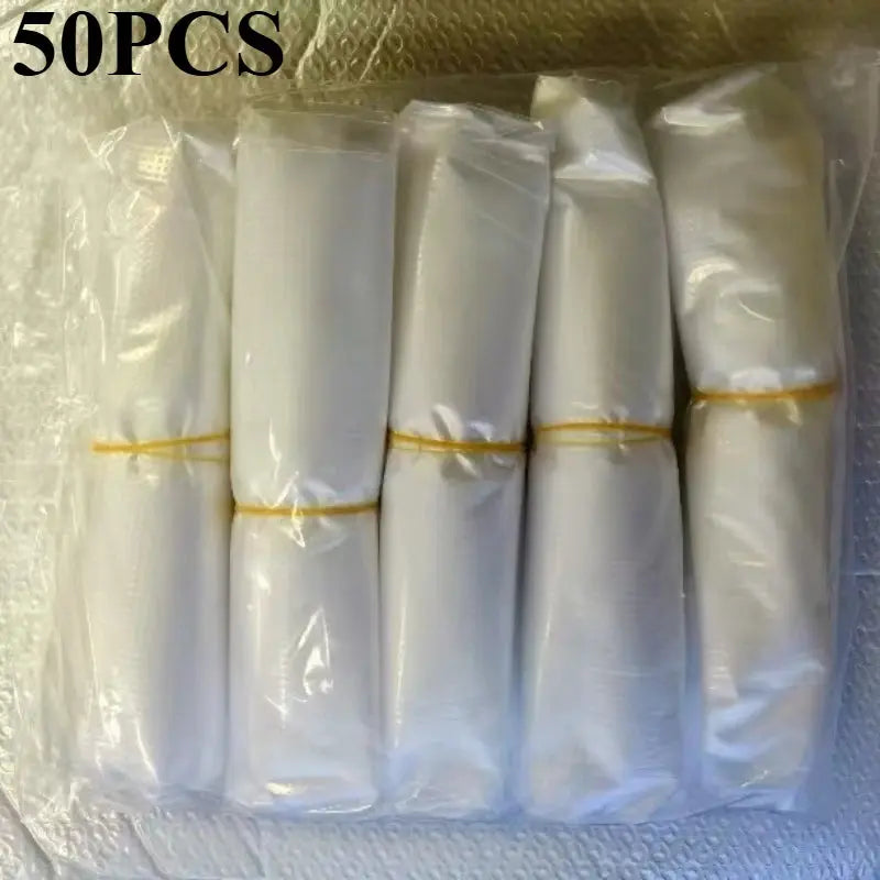 Set of 10/20/30 transparent waterproof disposable shoe covers by SHOPEZRA L.L.C., thick, wear-resistant outdoor rain shoe protectors.