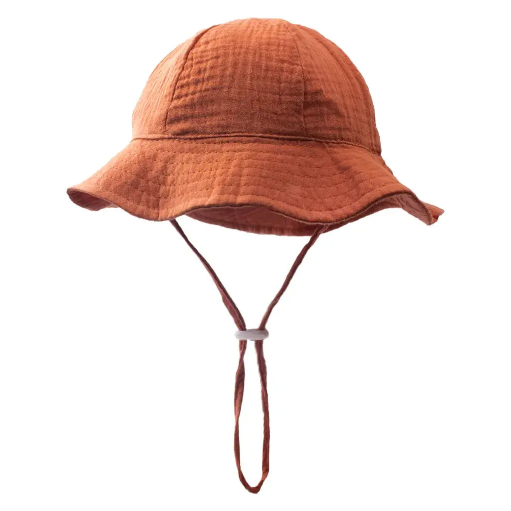 Baby cotton bucket hat by SHOPEZRA L.L.C., unisex outdoor sun hat with print for boys and girls aged 3-12 months.
