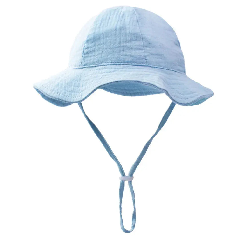 Baby cotton bucket hat by SHOPEZRA L.L.C. featuring a colorful print, perfect for sun protection for children ages 3-12 months.