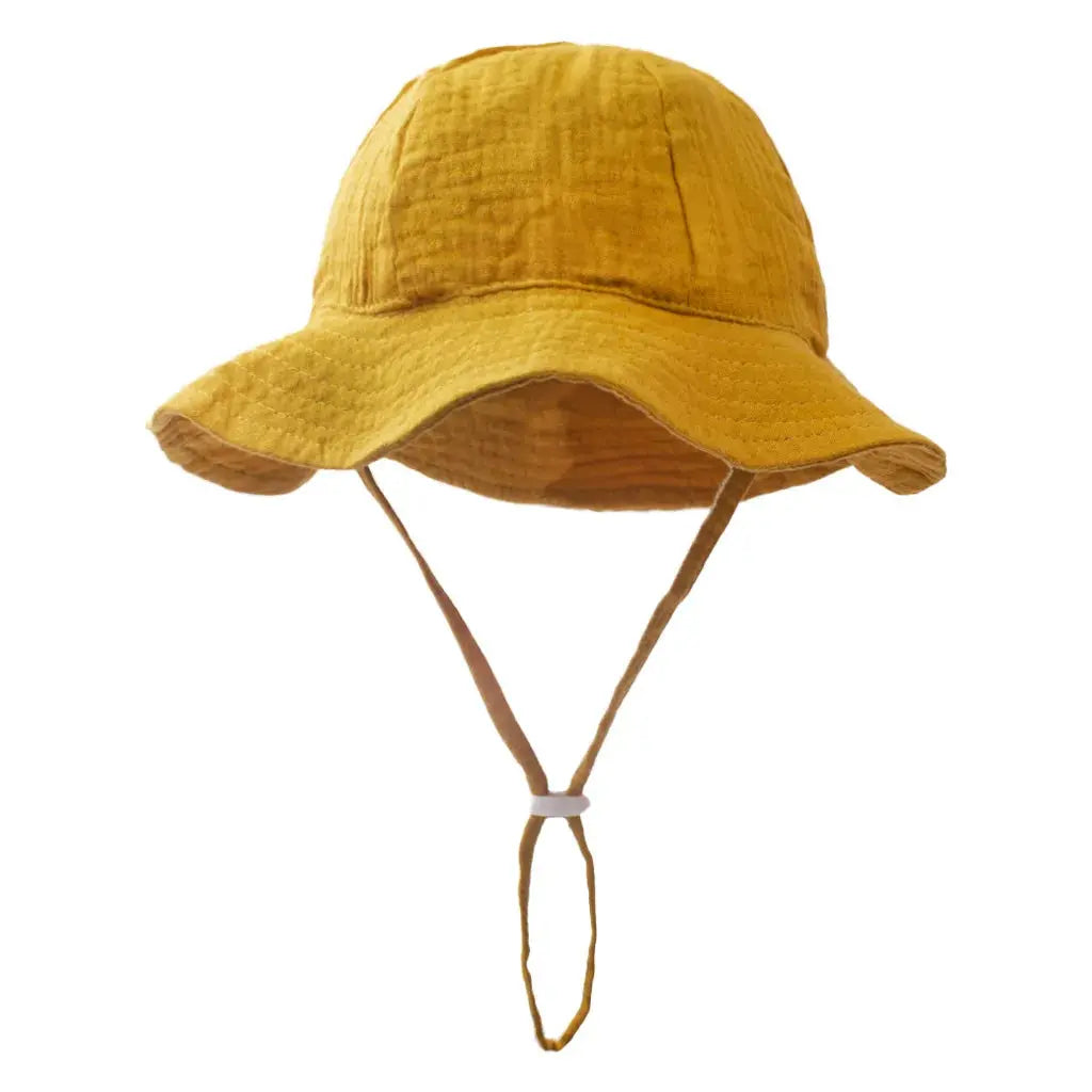 Baby cotton bucket hat by SHOPEZRA L.L.C. for children aged 3-12 months, featuring a sun protection outdoor print design.