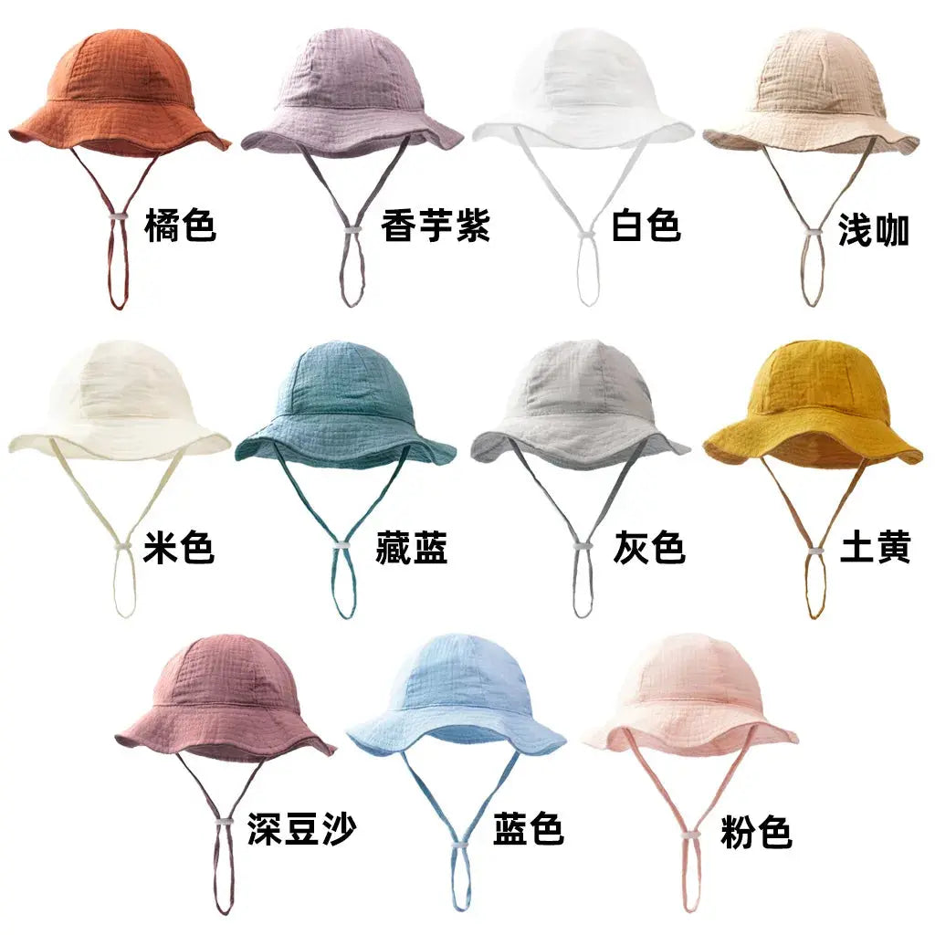 Blue baby cotton bucket hat by SHOPEZRA L.L.C., unisex sun hat for children aged 3-12 months, perfect for outdoor beach and fishing.