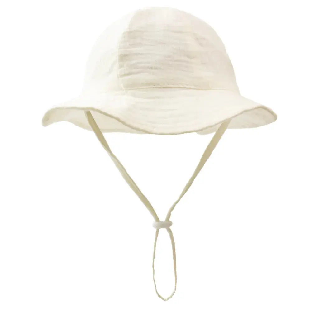 Blue baby cotton bucket hat by SHOPEZRA L.L.C. for children 3-12 months, unisex outdoor sun hat for beach and fishing.