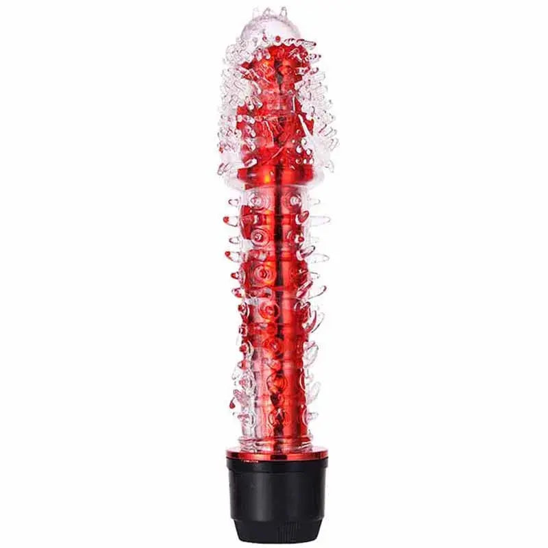 Blue SHOPEZRA L.L.C. dildo vibrator for women with dotted, ribbed, and barbed design, vibrating G-spot and clitoris stimulator.