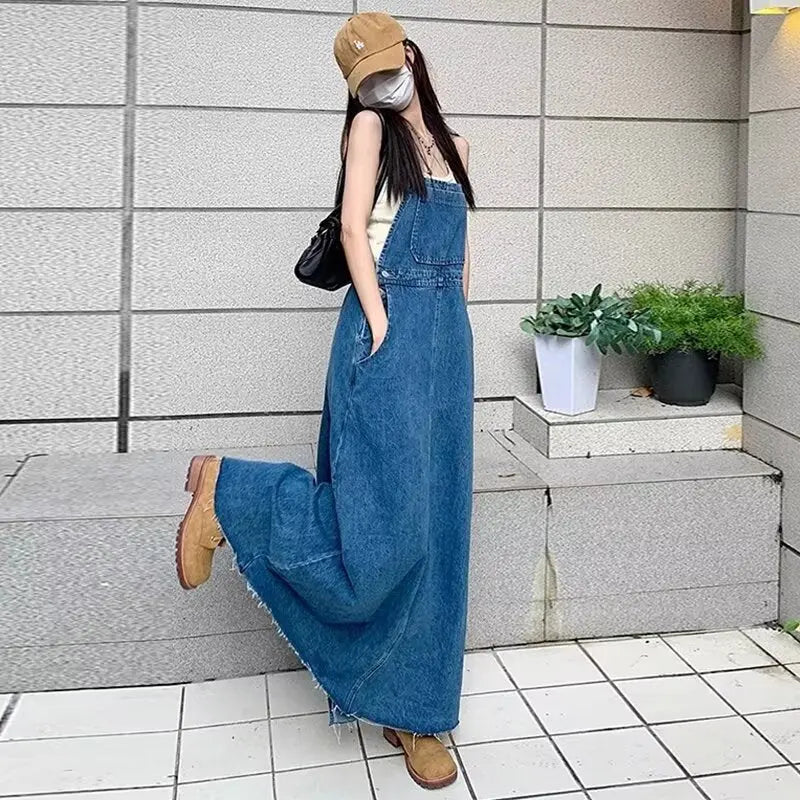 Blue denim suspender dress for women, loose fit, long style, perfect for tall women, from SHOPEZRA L.L.C., autumn 2026 fashion.