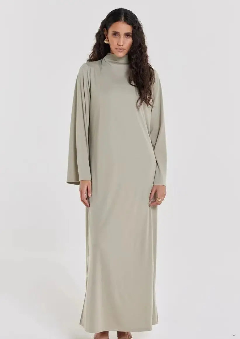 Brown women's Eid modest dress with long Kaftan style, prayer abaya, Dubai-inspired Arabic robe, perfect for Ramadan and special occasions.