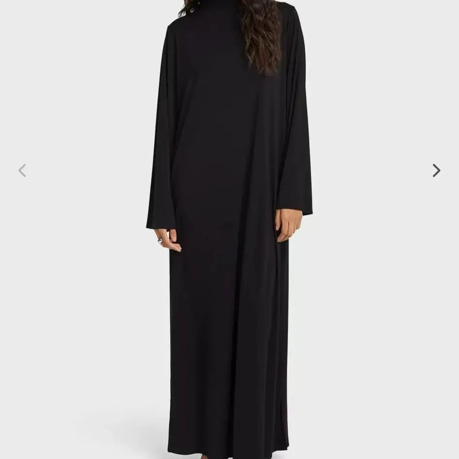 Brown women's Eid modest dress with long kaftan style, Arabic embroidery, suitable for prayer and special Ramadan occasions.