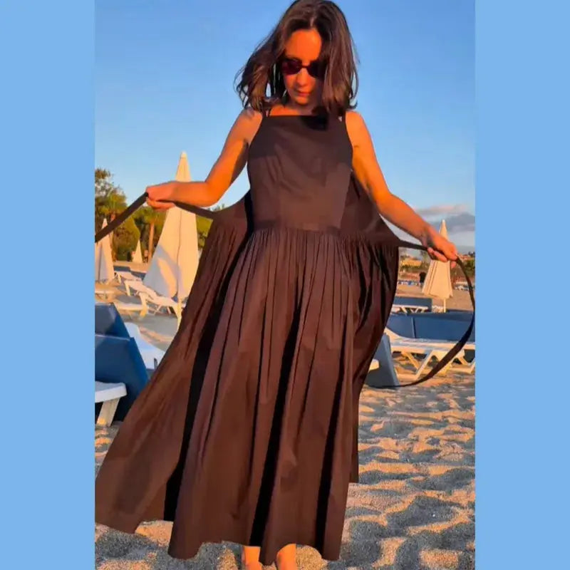 Brown women's lace-up pleated dress with square neck, sleeveless design, spaghetti straps, high waist, suitable for daily or date wear.