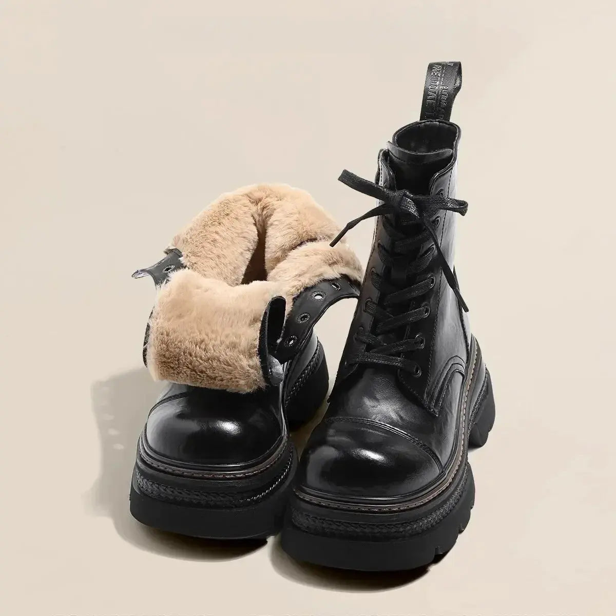 Brown winter women's waterproof snow boots with plush lining, lace-up design, platform height, and short outdoor style.