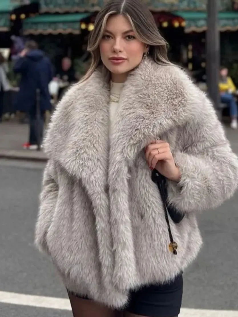 Brown plush coat for women by SHOPEZRA L.L.C., showing a cozy, oversized winter coat with a plush texture.