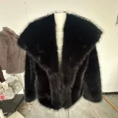 Brown plush coat for women by SHOPEZRA L.L.C., featuring a cozy, oversized design perfect for cold weather.