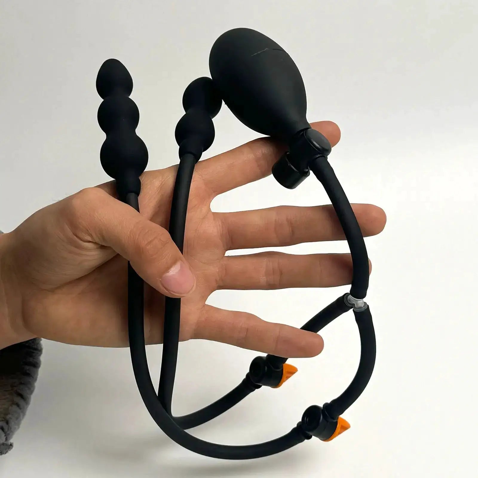 Inflatable anal plug sex toy by SHOPEZRA L.L.C. featuring a flexible, inflatable butt dilator with a remote control for adult pleasure.