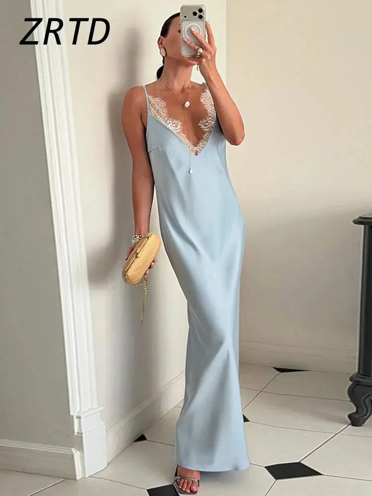 Yellow lace satin spliced women's summer sundress with V-neck, sleeveless, backless, and flowing long design for beach parties.