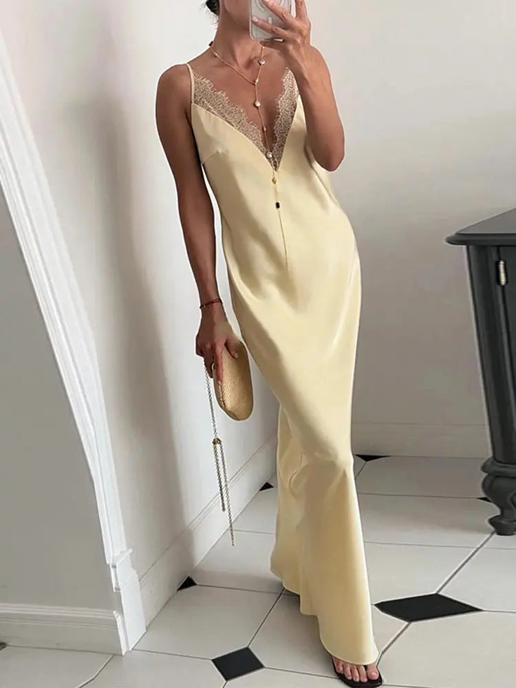 Yellow lace satin spliced summer dress by SHOPEZRA L.L.C., sleeveless, V-neck, backless, long, perfect for beach or party wear.