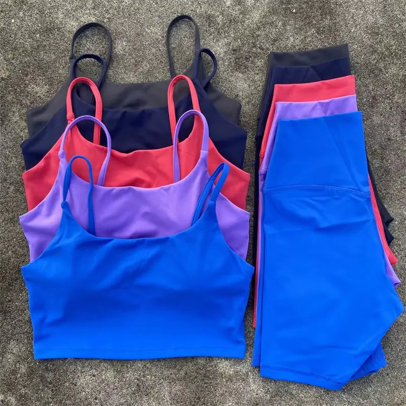 Purple women's yoga cycling shorts set with U-shaped strap bra, outerwear, and sports underwear for gym and yoga activities.