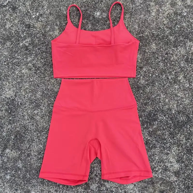 Women's purple yoga cycling shorts and U-shaped strap sports bra set by SHOPEZRA L.L.C., ideal for gym and yoga activities.