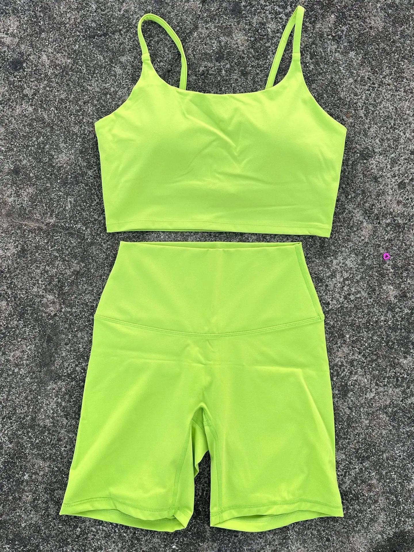 Purple women's tight yoga cycling shorts suit with U-shaped strap sports bra and outer wear, ideal for gym and yoga activities.