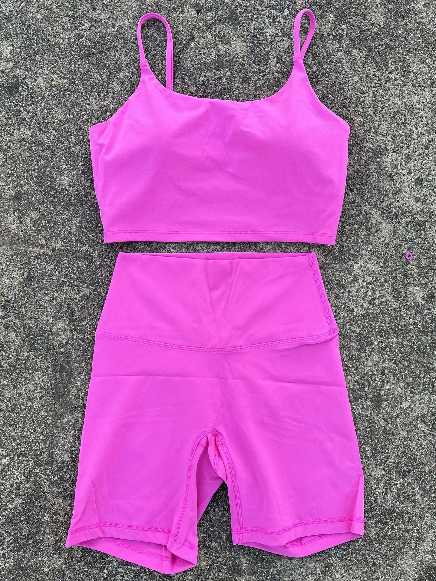Purple women's yoga cycling shorts and U-shaped strap bra set, featuring outer wear and sports underwear for gym and yoga.