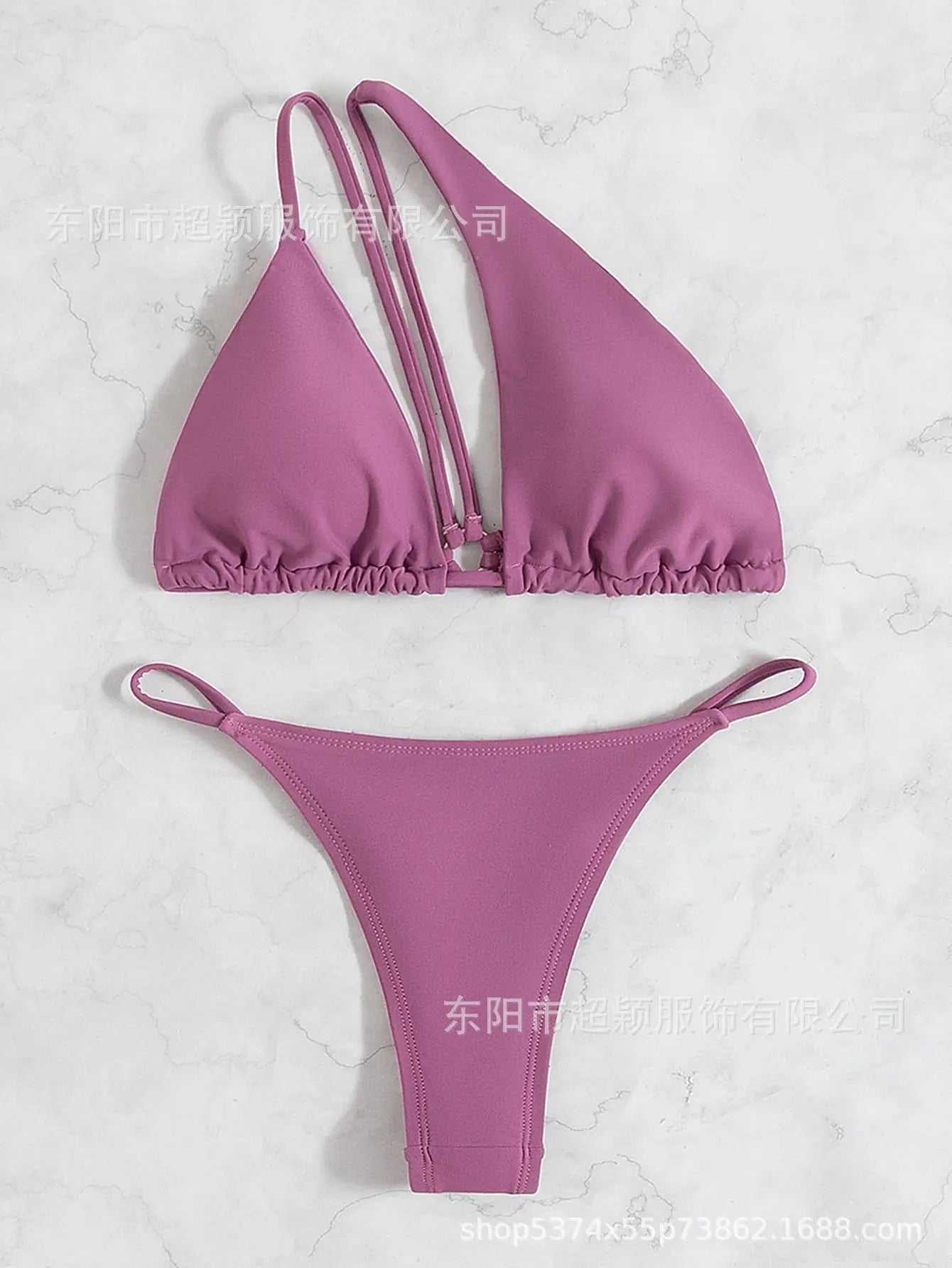 Brown bikini swimsuit by SHOPEZRA L.L.C. featuring a thong style, stone decoration, pinxiu back, and split shoulder design.