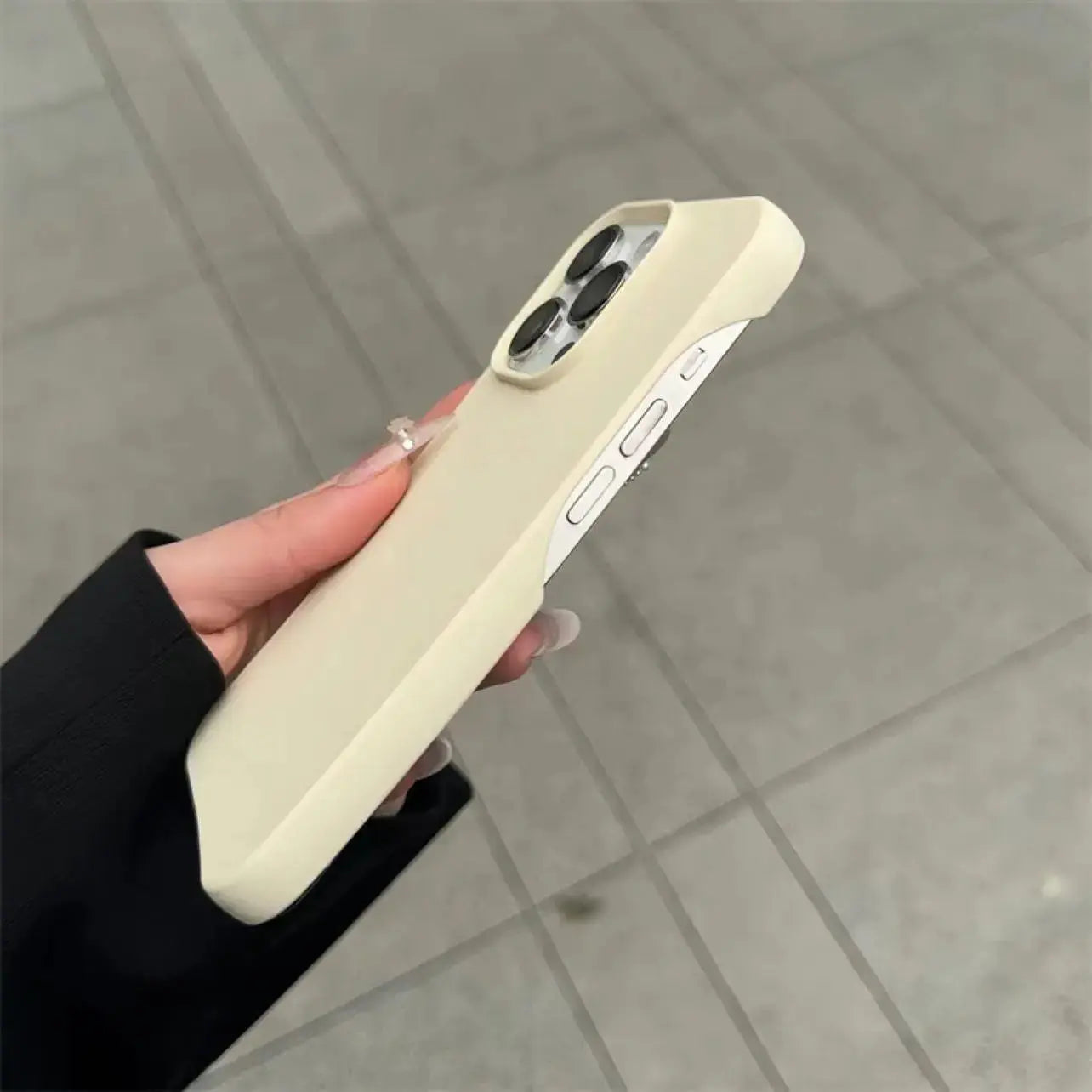 Black graphite iPhone 15 Pro Max case by SHOPEZRA L.L.C., half-pack design, protective and sleek for modern smartphones.