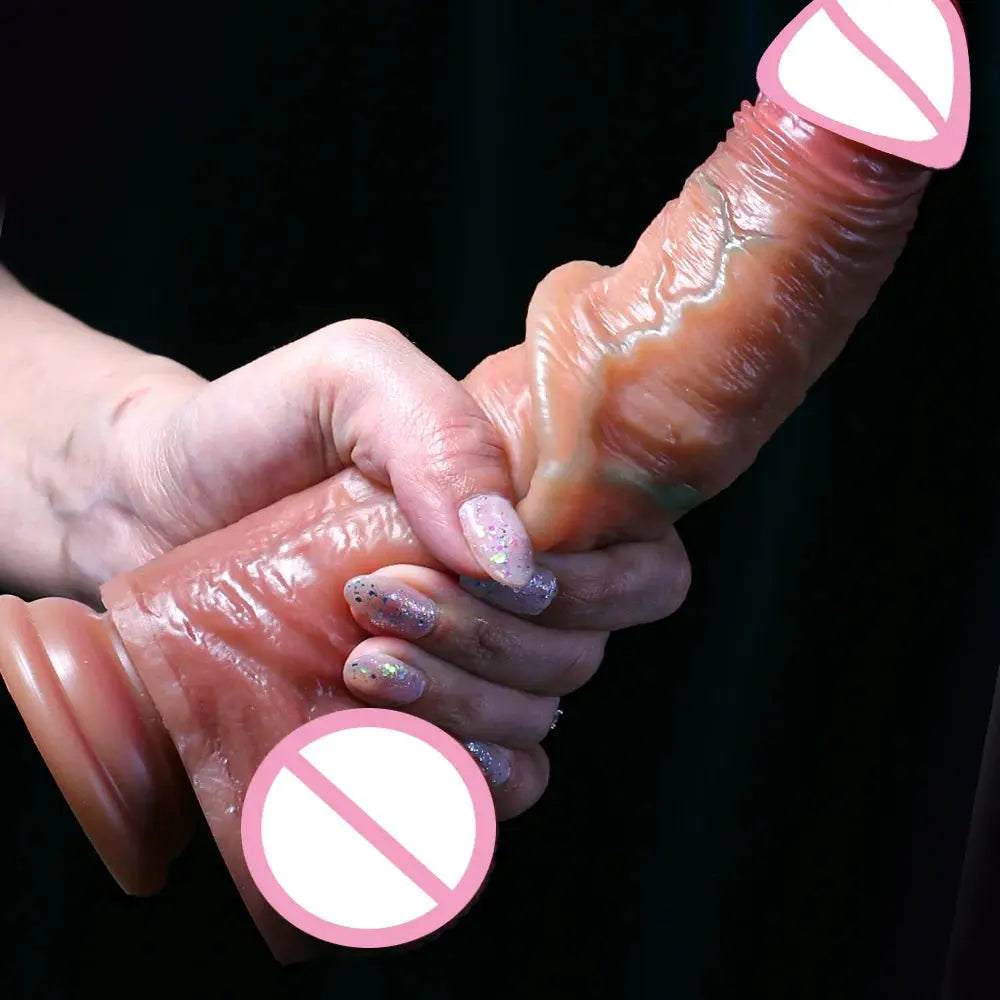 Realistic dildo for female masturbation with skin-like texture, foreskin, and large penis design, ideal for anal and vaginal penetration.