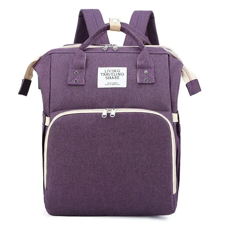 Dark blue large-capacity mommy bag by SHOPEZRA L.L.C. with multiple compartments and sturdy handles for organized parenting needs.