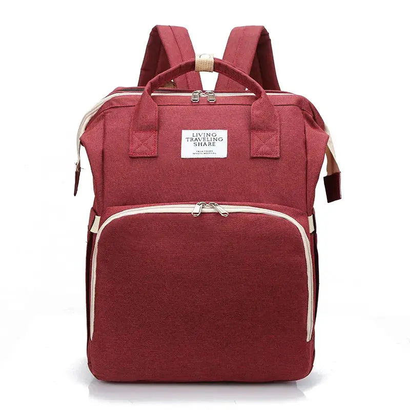 Dark blue large-capacity mommy bag by SHOPEZRA L.L.C., showing multiple compartments and adjustable straps for moms on the go.
