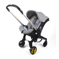 4-in-1 baby cradle stroller in dark gray designed for infants aged 0-24 months, versatile and multifunctional.