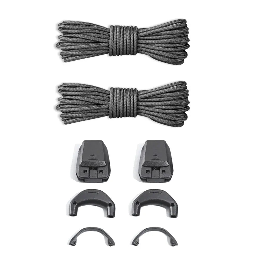 Pair of dark grey quick-lace kit round no-tie shoelaces for Salomon running sneakers, featuring easy slip-on design for tennis and running shoes.